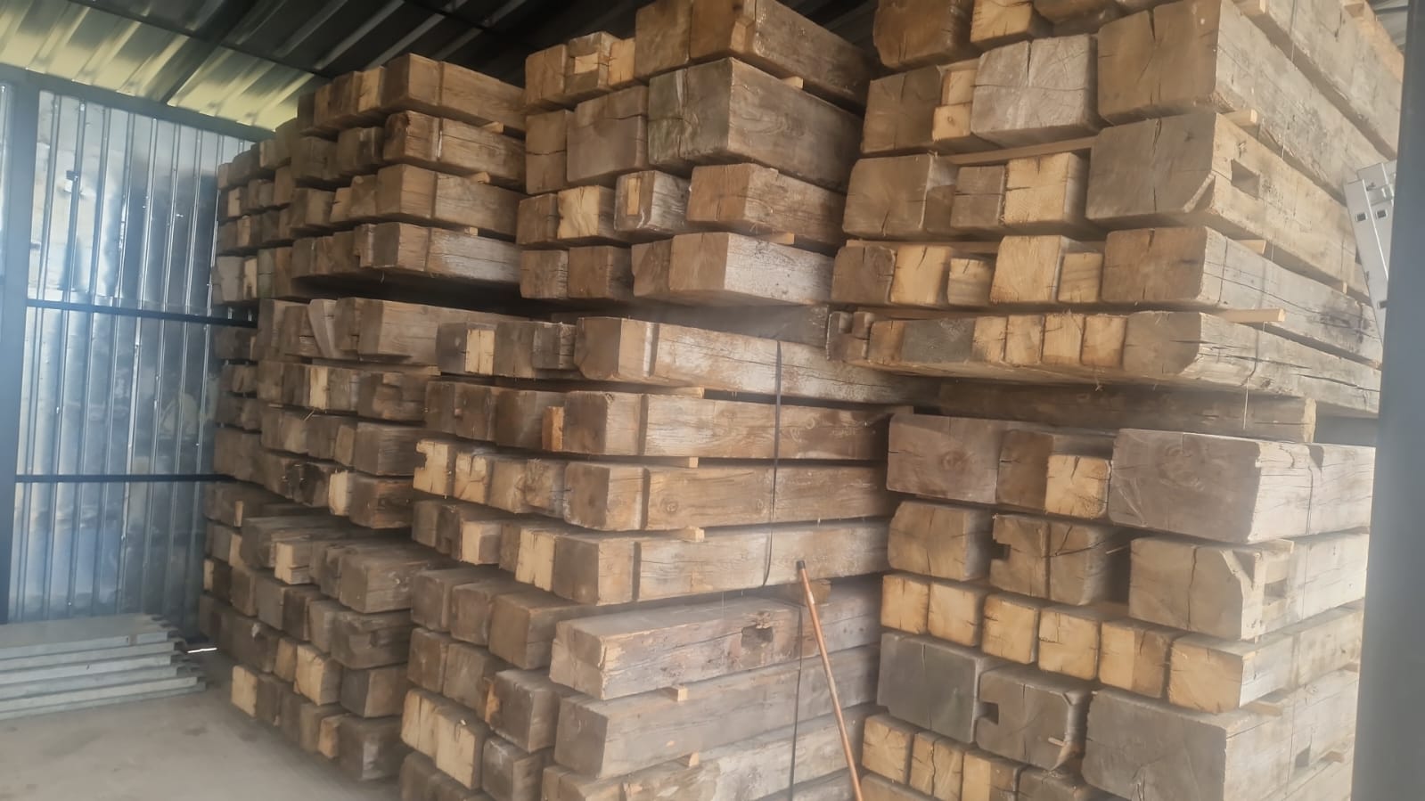 Salvaged beams, centuries old oak, axe marks and original patina preserved