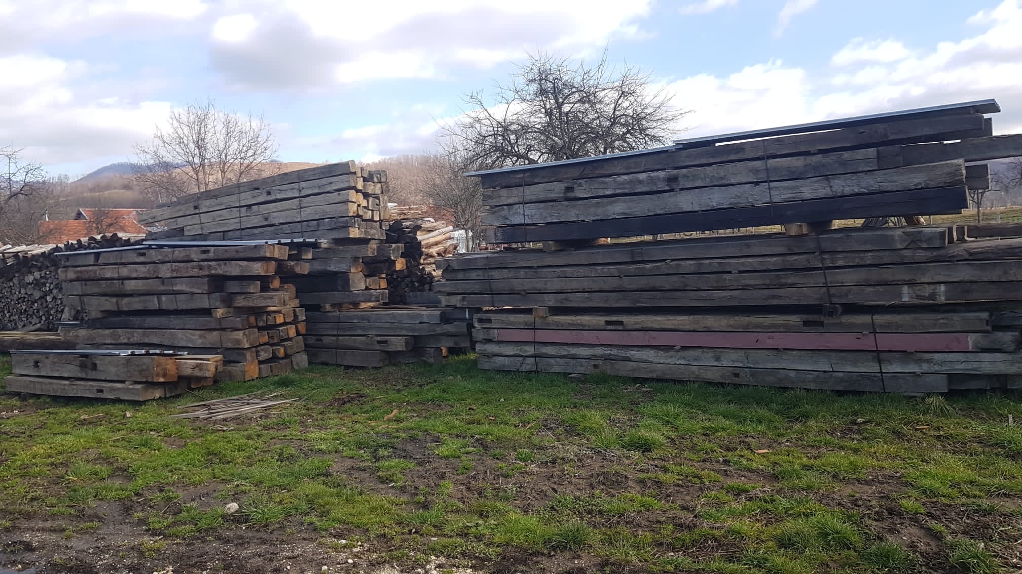 Dark patina beams, naturally aged over 150 to 200 years