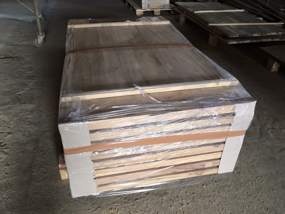 Reclaimed oak panels, palletized and wrapped for project shipment planning