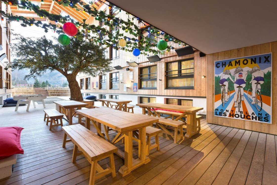 Outdoor restaurant terrace, solid oak tables and benches